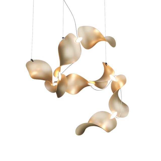 The wide, undulating curves of large sand dunes inspired us to create the modular Dune light fixture. Fascinated by the...