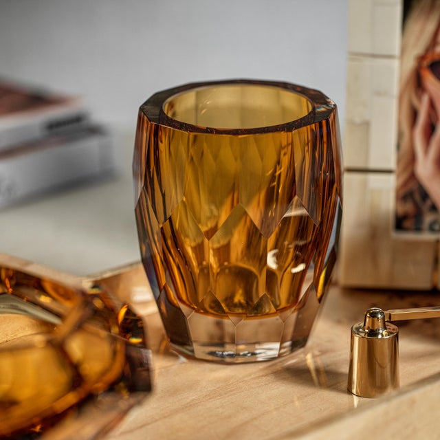 The chiseled cut look of this crystalline glass vase is beautiful to behold. Empty or filled with your favorite botanicals...