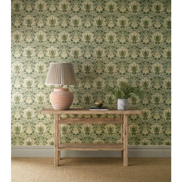 Retaining the striking shield motif of the original document Iris & Rose celebrates both flowers in a richly ornamental...