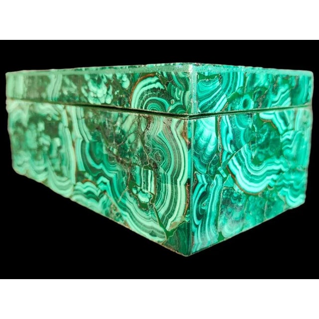 Malachite Box Elegant malachite box from the 50s. It is in perfect condition. Measurements: 21x11x8 cm. This piece is...