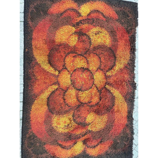 Discover the timeless elegance of this exquisite vintage Scandinavian rug crafted by Desso Mechanical Manufacturing....