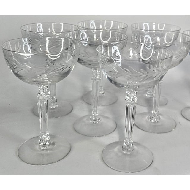 This is Fostoria Glass's holly/ laurel in a champagne coupe. I have eight of these long stemmed beauties, ready for your...