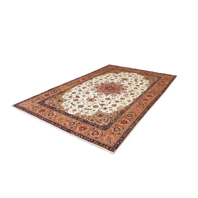 Hand-knotted rug from Tabriz | Knot density: 200.000 knots/m² | Material: 100% virgin wool | Size: 201 x 295 cm | In very...
