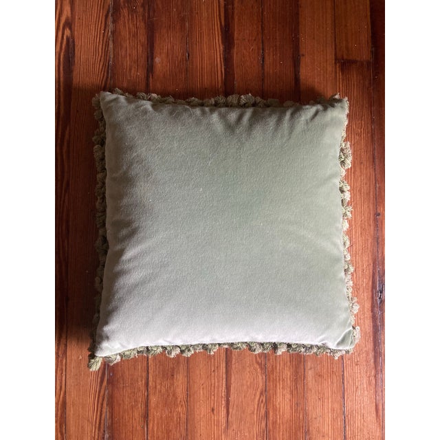 Very pretty authentic 19th century down filled French Needlepoint pillow. It has beautiful fringes and the back is velvet....
