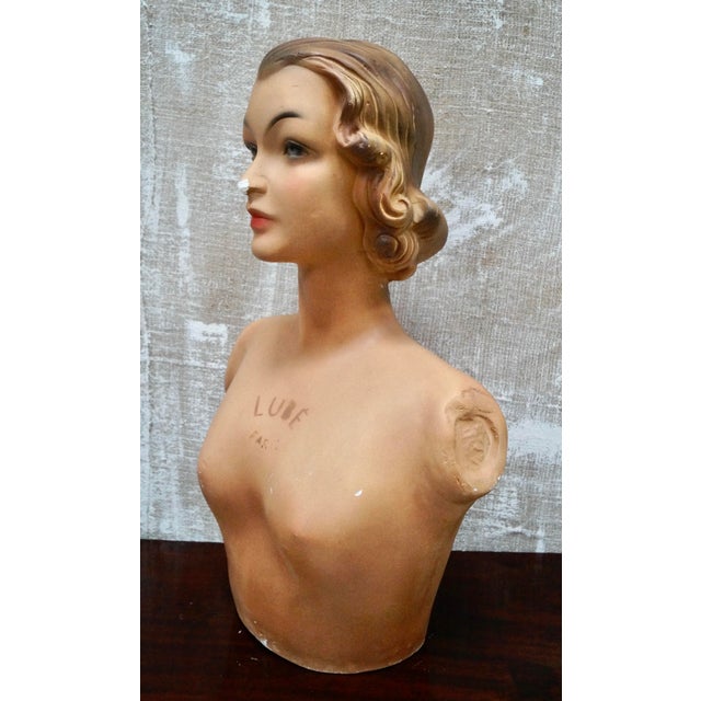 An original Art Deco shop mannequin. Made from plaster from the Lubé brand in Paris representing a female bust, from the...