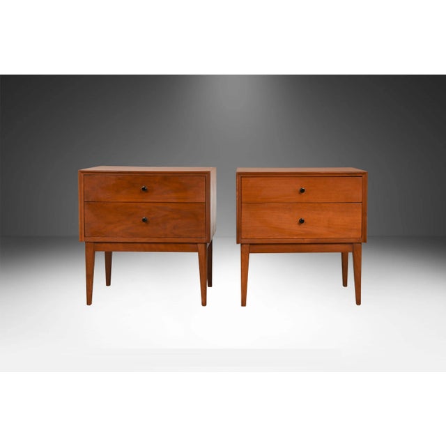 Striking pair of mid-century modern walnut nightstands or end tables by American of Martinsville, circa 1970’s, one of the...