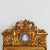 Gustavian gem! This mirror is something special with carved decoration consisting of laurel leaf and rosette. Gilded and...