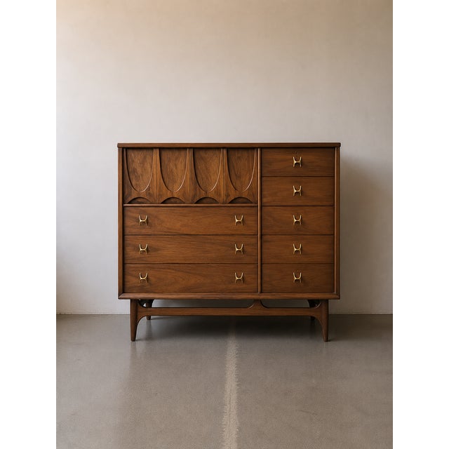 An iconic Broyhill Brasilia gentleman's cabinet from the highly sought-after Brasilia collection. Known for its sculptural...