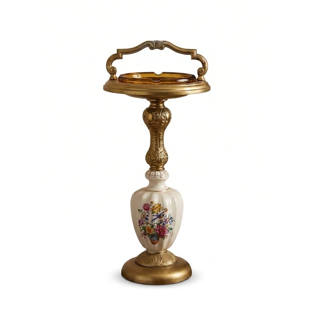 Bring classic mid-century elegance to your home with this stunning Hollywood Regency floor ashtray stand. The piece...