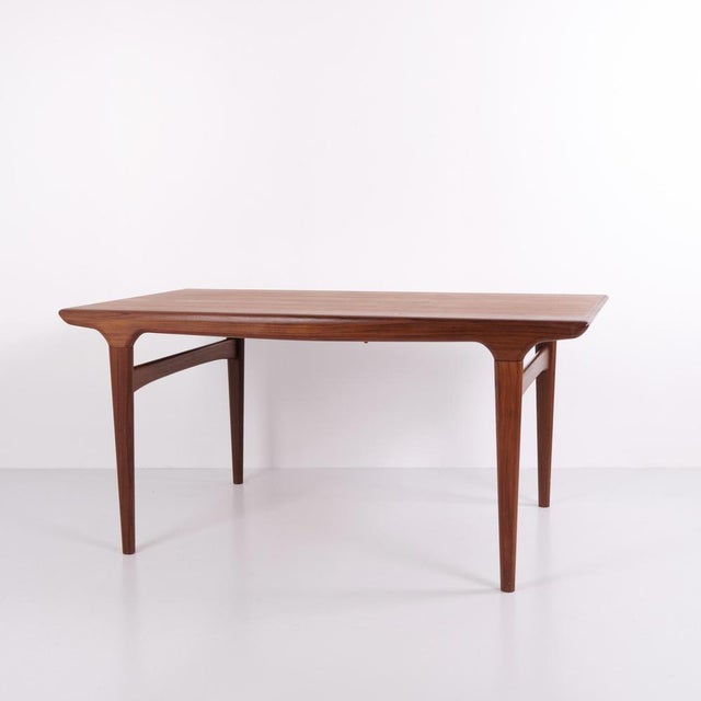 Dining table designed by johannes andersen and manufactured by uldum møbelfabrik in the 1960s. Crafted in teak, the table...