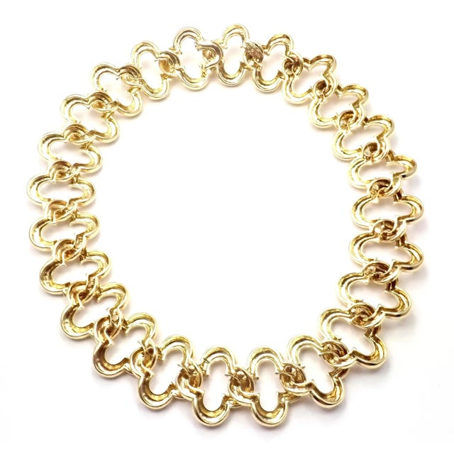 18k Yellow Gold 24 Large Motifs Alhambra Choker Necklace by Van Cleef & Arpels. Details: Metal: With 24 large motifs of...