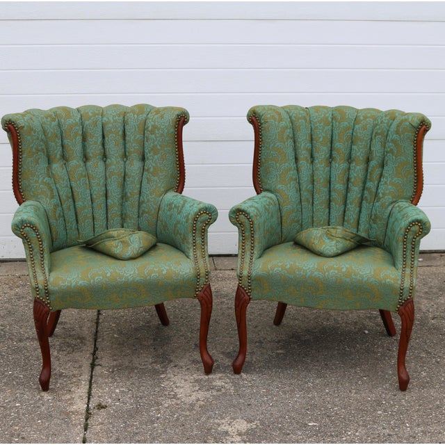 This solid, sturdy set of channel-back chairs is upholstered in a rich, heavy green and gold damask fabric and finished...