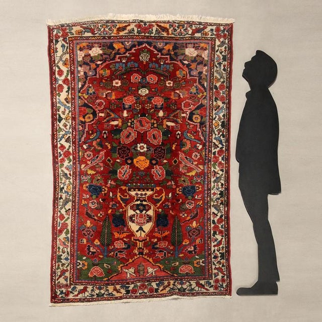 Bakhtiari rug in cotton and wool, large knot and hand-made. This piece is attributed to the mentioned designer/maker. It...