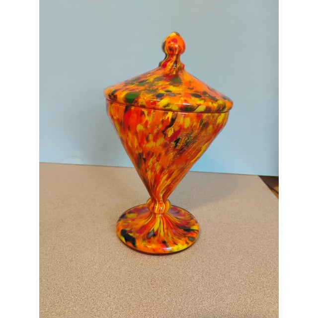 Franz Welz Czech art glass lidded candy dish. Beautiful multi colored splatter design . Jar measures 10" high and 5.5" in...