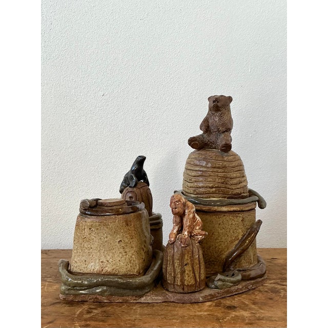 This captivating artisan studio pottery set is a masterful expression of 1970s folk art, presenting a whimsical "circus"...