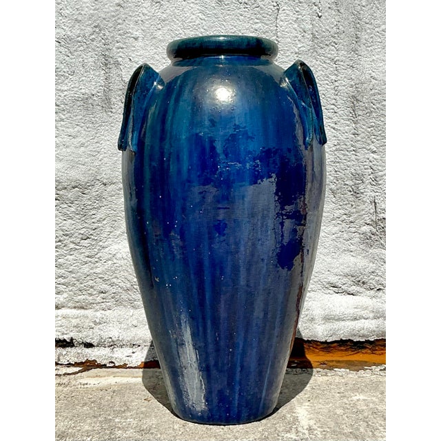 Make an impactful statement with this breathtaking Vintage Boho Monumental Glazed Ceramic Urn, a true sculptural...