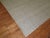 Plain solid gray one of a kind Turkish Kilim with small specs in black. 10' x 14'1''