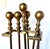 Imported from Italy. Brass fireplace tool set The set includes a stand, broom, shovel, poker, and tongs. The base for the...