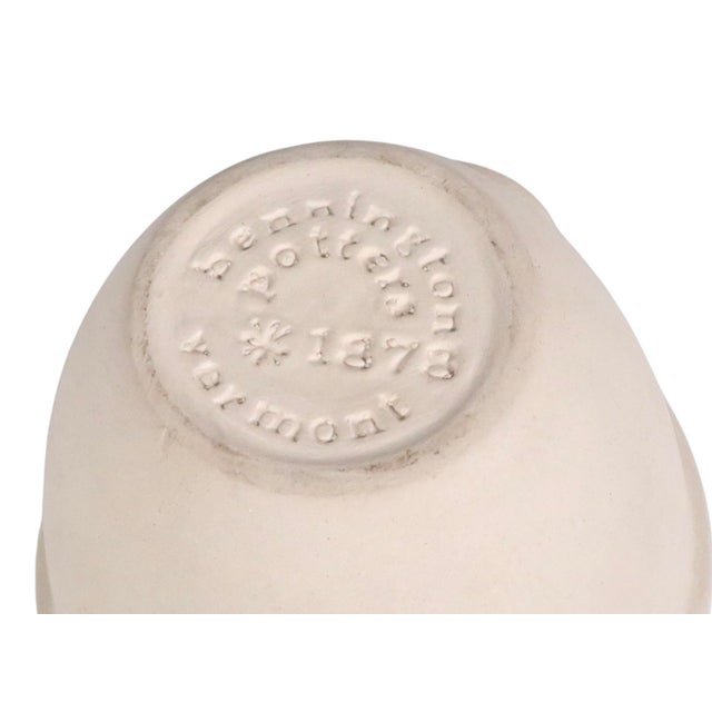 Small batter mixing bowl by Bennington Potters Vermont, design attributed to David Gil. The bowl features a sand colored...