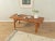 Classic coffee table from the 1960s. High-quality solid wood frame with a solid teak tabletop. Quality features: Excellent...