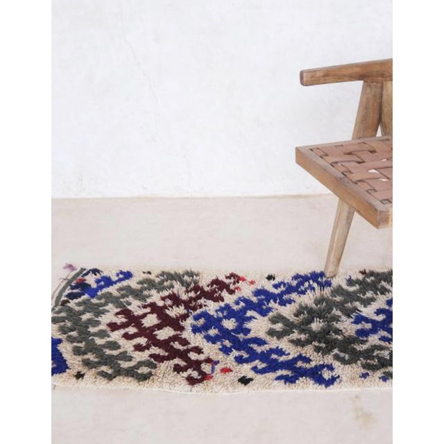 Vintage Moroccan Rug – Handwoven Wool with Layered Tribal Medallions This vintage Moroccan rug is a beautiful example of...