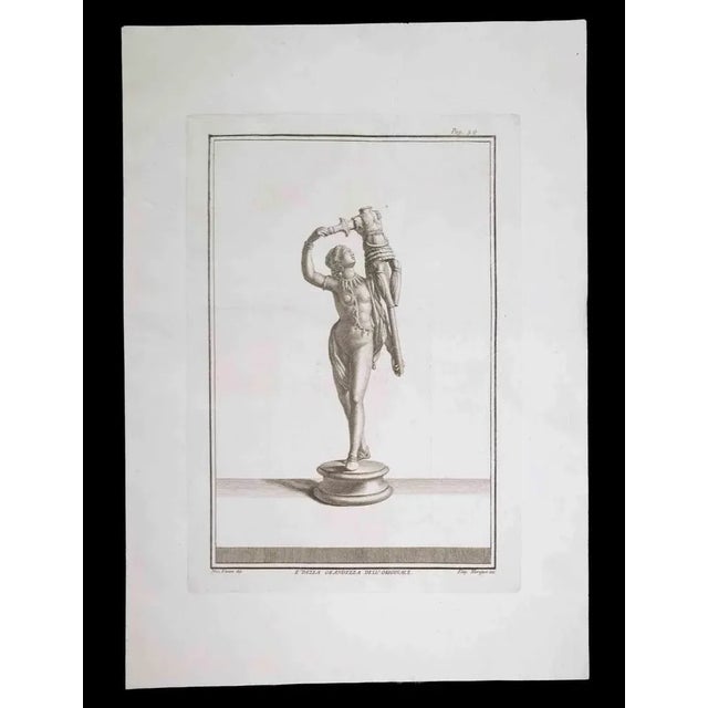 Ancient Roman Statue, from the series "Antiquities of Herculaneum", is an original etching on paper realized by Filippo...