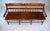 An American 19th century Pennsylvania pine & poplar Windsor bench with half spindles and single board plank seat. At...