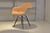 Charles and Ray Eames Armchair, Fiberglass reinforced polyester shell, fully upholstered on Miller Dowel legs. Upholstery...