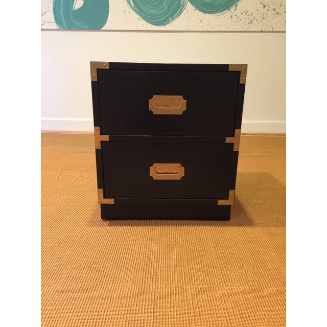 Handsome campaign style nightstand manufactured by Bernhardt. Useful as an accent table, side table or nightstand. Black...
