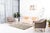 A hand-knotted wool rug, made in India and measuring 8' x 10'. Floral drawing carried across the field inside a...