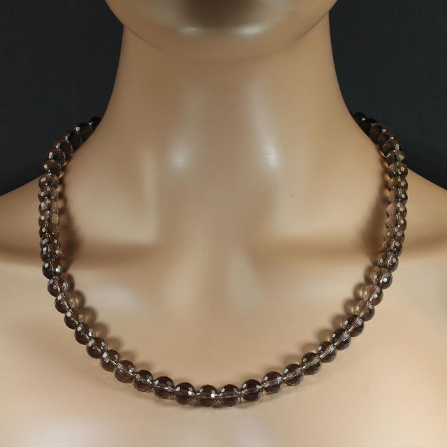 A 24‑inch faceted smoky quartz necklace like this deserves a description that truly captures its elegance and presence....