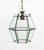 Midcentury amazing chandelier lantern in brass and beveled glass in the style of Adolf Loos. Made in Italy in the 1950s....
