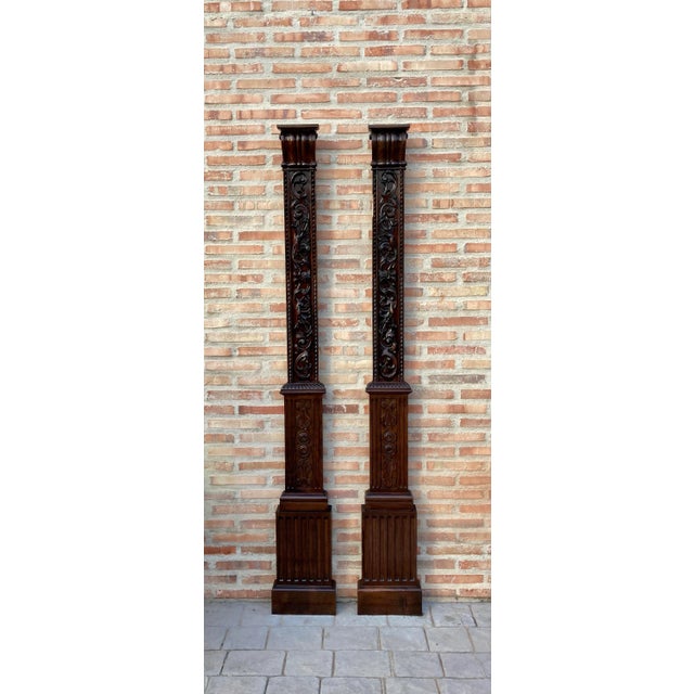 Pair of carved oak panels, will lend an architectural accent to an area. They are carved with linen fold motifs on the...