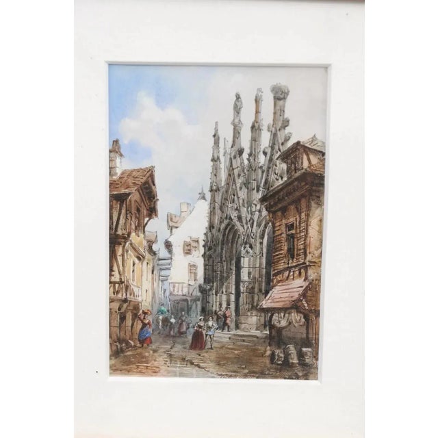 A pair of French framed watercolors from the mid 19th century by Théodore Henri Mansson depicting Gothic churches in...