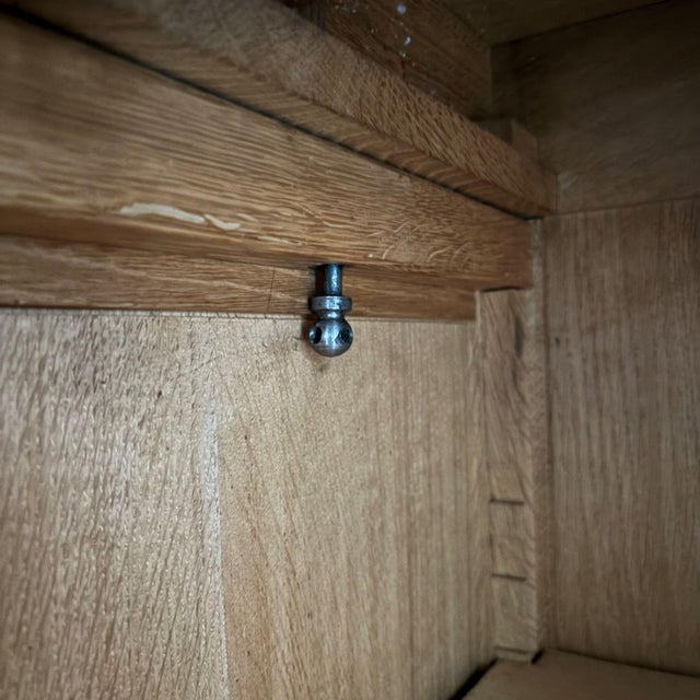 Beautiful Art Deco, Amsterdamse School cabinet with wonderful door knobs and a drawer over the full width below. Gives...