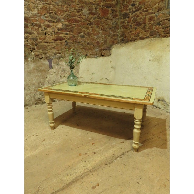 This is an unusual and attractive solid pine table dating to the late 20th century. The table is traditionally styled and...