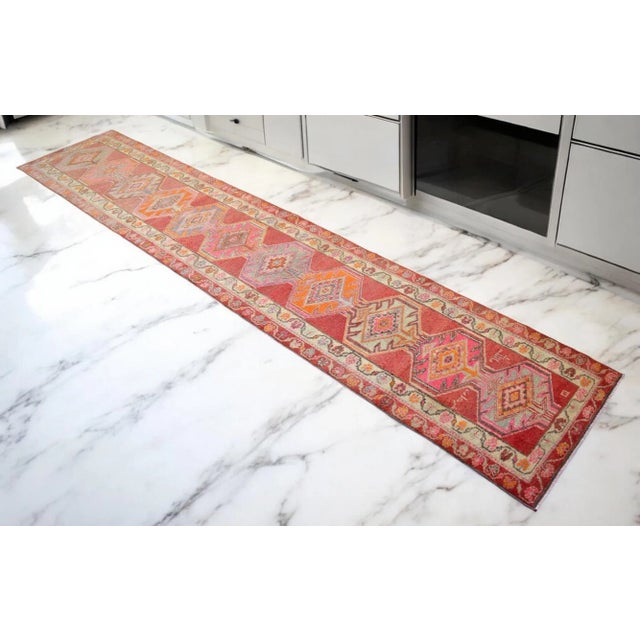 Offered is a one of a kind Kurdish runner rug, made in Anatolia approximately 50-60 years ago. The beautiful wool on wool...