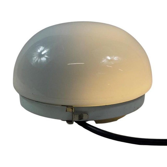 Ceiling mounted lamp attributed to the style of Gispen because of the way it can be opened and closed. On top of a white...