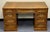 Very nice well cared for vintage campaign style desk. Double pedestal design with a total of 7 drawers. The center drawer...