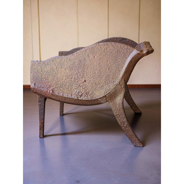 Cast iron fireplace log holder/basket. Height 19 cm. Length 25 cm. Depth 24 cm. In good condition with normal signs of...
