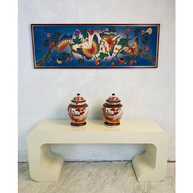 This beautiful painting is on fabric. Very finely painted and great quality. Framed