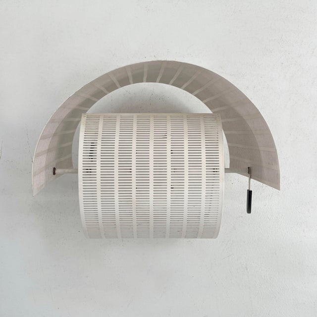 Shogun Wall Lamp by Mario Botta for Artemide, 1980s, in Good conditions. Designed 1980 to 1989 This piece has an...
