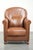 We are offering this beautiful, stately armchair in excellent condition, crafted from sheepskin leather with a refined...
