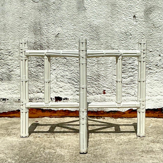 Bring coastal charm to your dining area with our Vintage Coastal Bundled Rattan Dining Table Pedestal After McGuire. This...