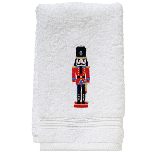 Our elegant Nutcracker terry guest towel is a great accent to your bathroom and goes beautifully with our matching tissue...