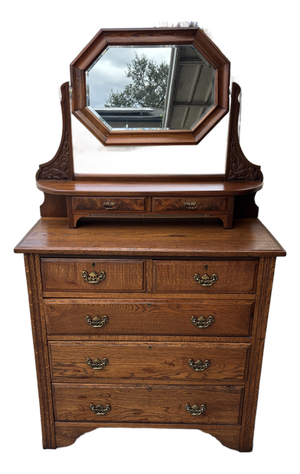 Antique Quartersawn Oak Chest of Drawers Featuring an Adjustable Octagonal Swing Mirror and Decorative Brass Pulls