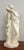 Carrara marble sculpture depicting a romantic young girl with a jug leaning on a pilaster carved with the image of a...