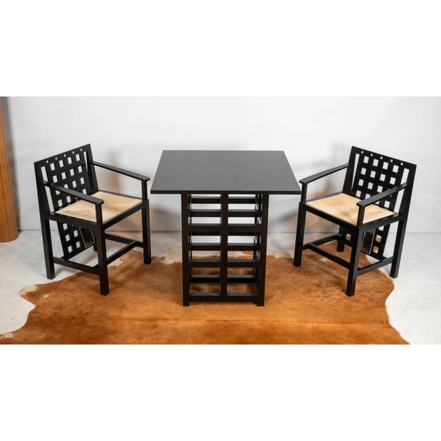 Cassina D.S. 2 dining table designed by Charles Rennie Mackintosh in 1918, circa 1980s. Square table with grid frame,...