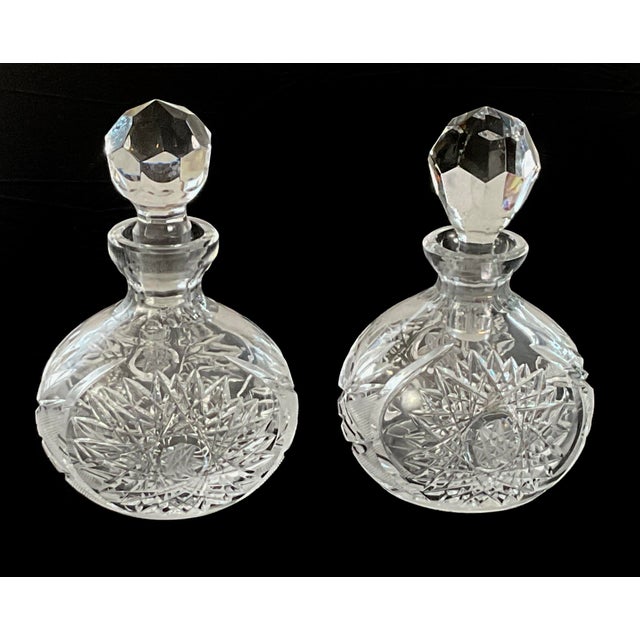 Rather rare-a matching pair of ABP-cut glass decanters/perfumes The workmanship, and the slight variance of each piece –...