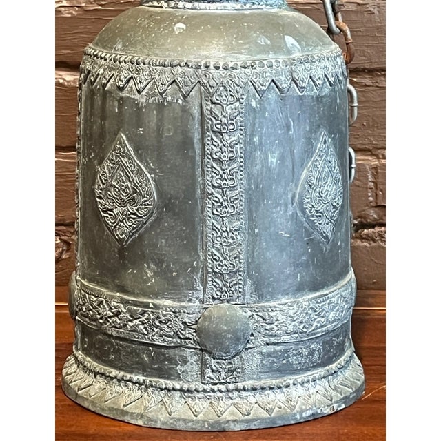 Bring home a magnificent piece of heritage with this large vintage temple bell, standing 21 inches high by 9 inches wide....